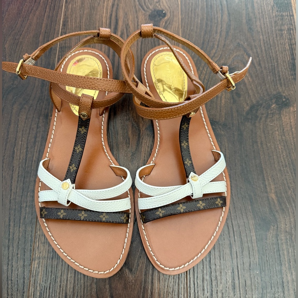 Louis Vuitton Brown and White Leather Sandals with Buckle Straps.